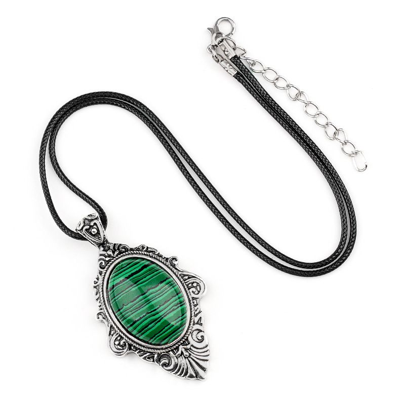 Pingente de pedra de olho de tigre natural, espelho mágico feminino estilo retro 31 * 46mm bainha pingente de cristal incrustado.