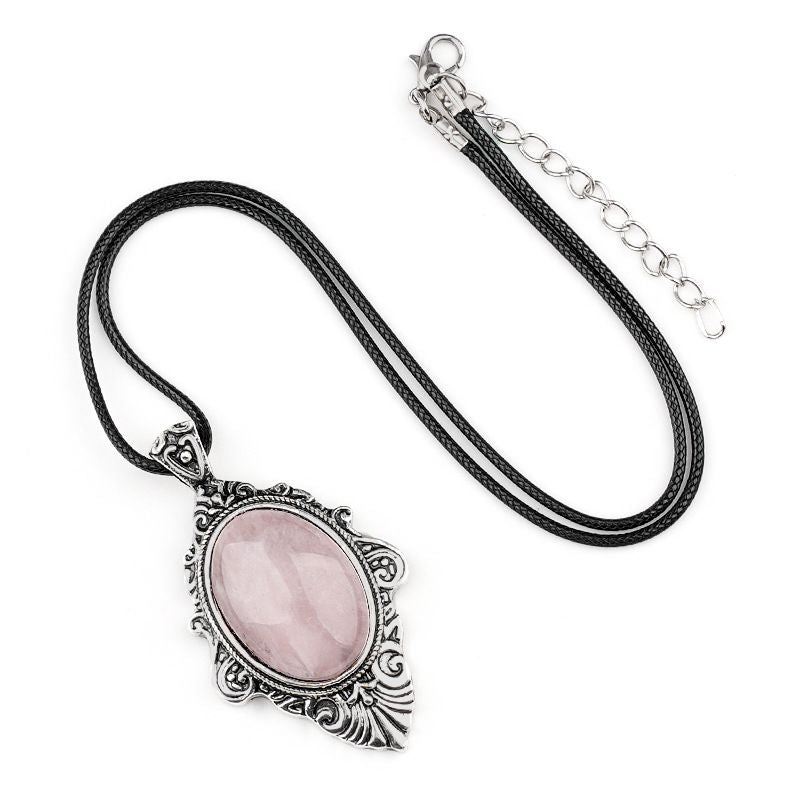 Pingente de pedra de olho de tigre natural, espelho mágico feminino estilo retro 31 * 46mm bainha pingente de cristal incrustado.