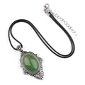 Pingente de pedra de olho de tigre natural, espelho mágico feminino estilo retro 31 * 46mm bainha pingente de cristal incrustado.