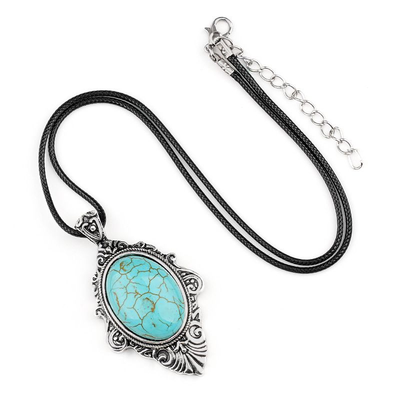 Pingente de pedra de olho de tigre natural, espelho mágico feminino estilo retro 31 * 46mm bainha pingente de cristal incrustado.