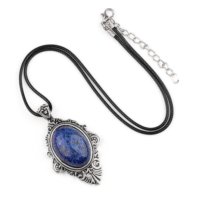 Pingente de pedra de olho de tigre natural, espelho mágico feminino estilo retro 31 * 46mm bainha pingente de cristal incrustado.