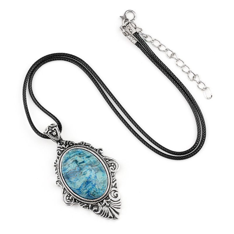 Pingente de pedra de olho de tigre natural, espelho mágico feminino estilo retro 31 * 46mm bainha pingente de cristal incrustado.