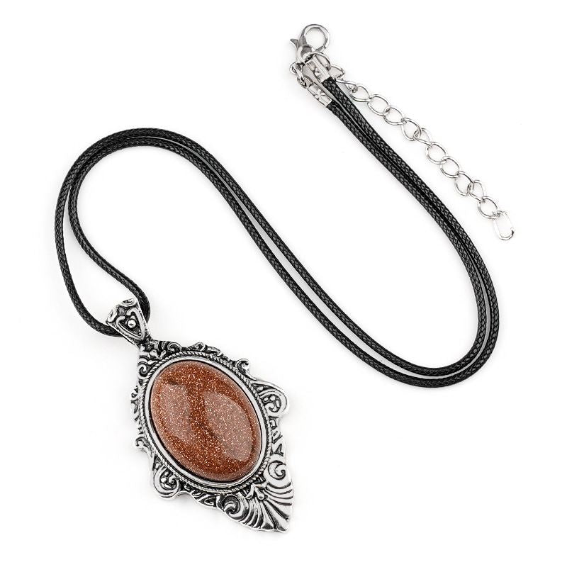 Pingente de pedra de olho de tigre natural, espelho mágico feminino estilo retro 31 * 46mm bainha pingente de cristal incrustado.