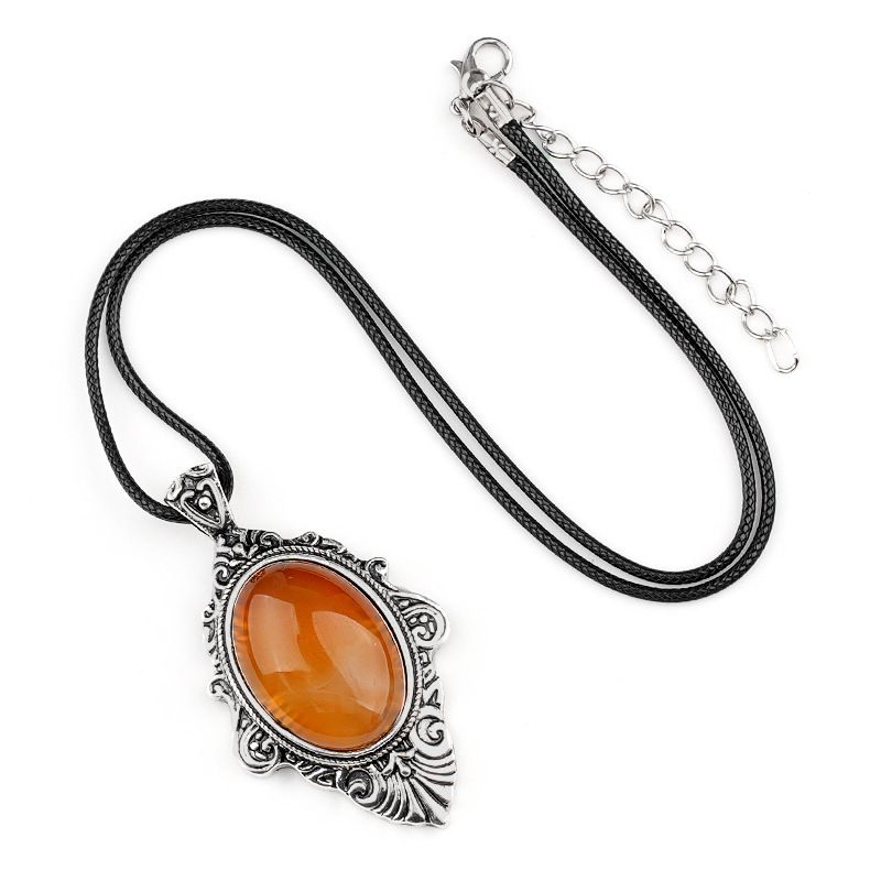 Pingente de pedra de olho de tigre natural, espelho mágico feminino estilo retro 31 * 46mm bainha pingente de cristal incrustado.
