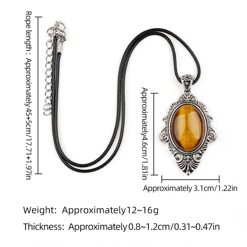 Pingente de pedra de olho de tigre natural, espelho mágico feminino estilo retro 31 * 46mm bainha pingente de cristal incrustado.