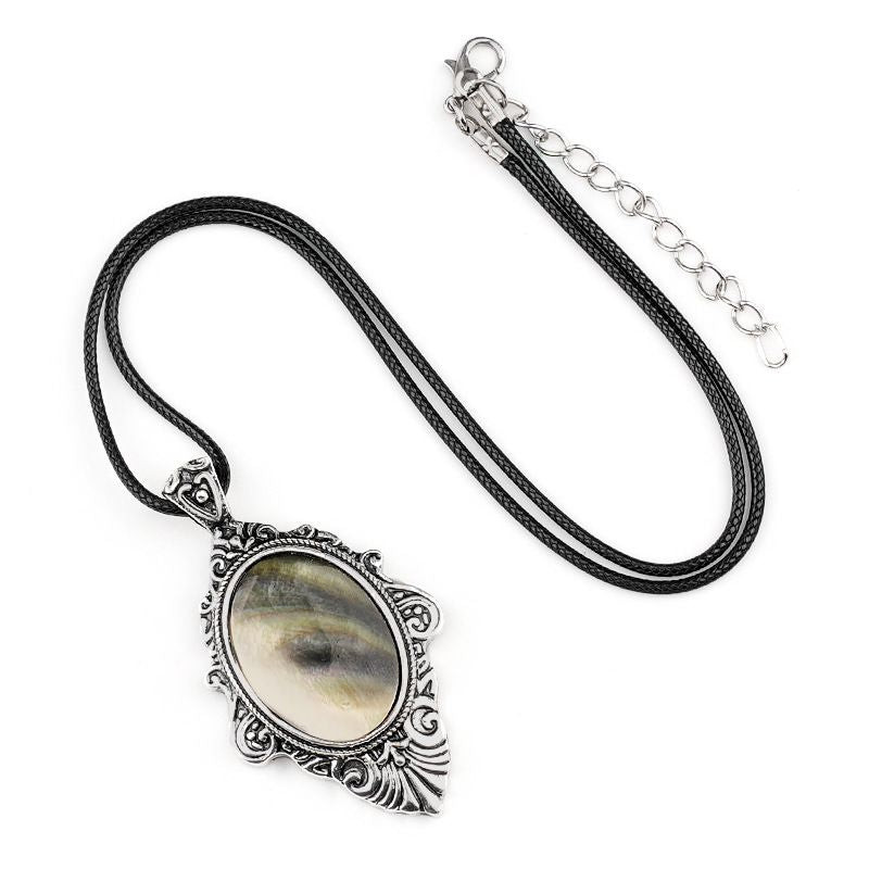 Pingente de pedra de olho de tigre natural, espelho mágico feminino estilo retro 31 * 46mm bainha pingente de cristal incrustado.