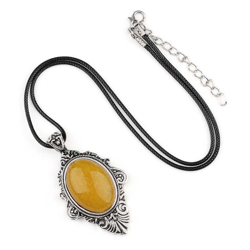 Pingente de pedra de olho de tigre natural, espelho mágico feminino estilo retro 31 * 46mm bainha pingente de cristal incrustado.