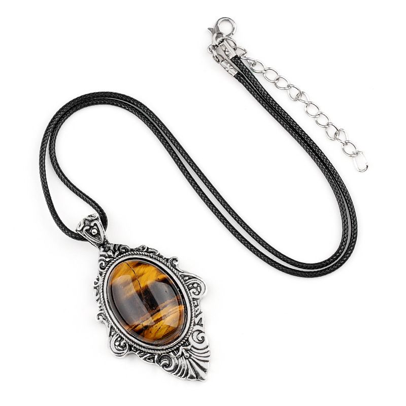 Pingente de pedra de olho de tigre natural, espelho mágico feminino estilo retro 31 * 46mm bainha pingente de cristal incrustado.